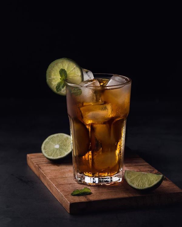 Pouring kombucha over ice